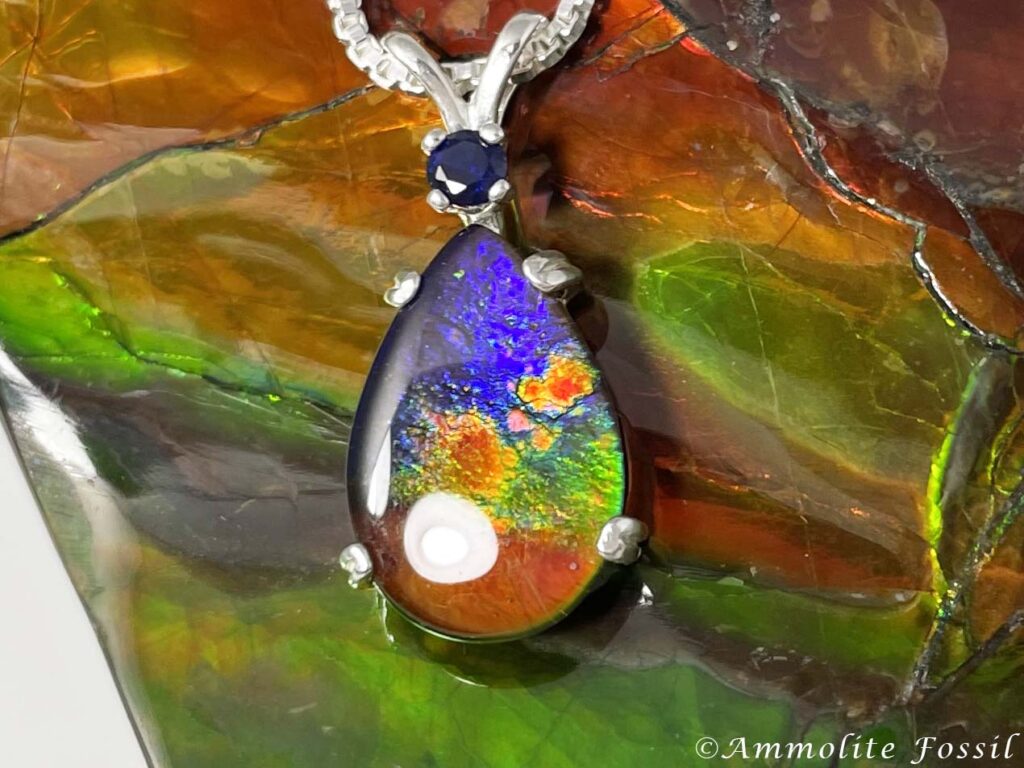 ammolite buying tips aa grade jewelry chromatic shift color play rare violet pink